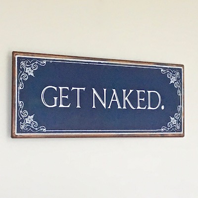 'Get Naked' Vintage Metal Hanging Sign